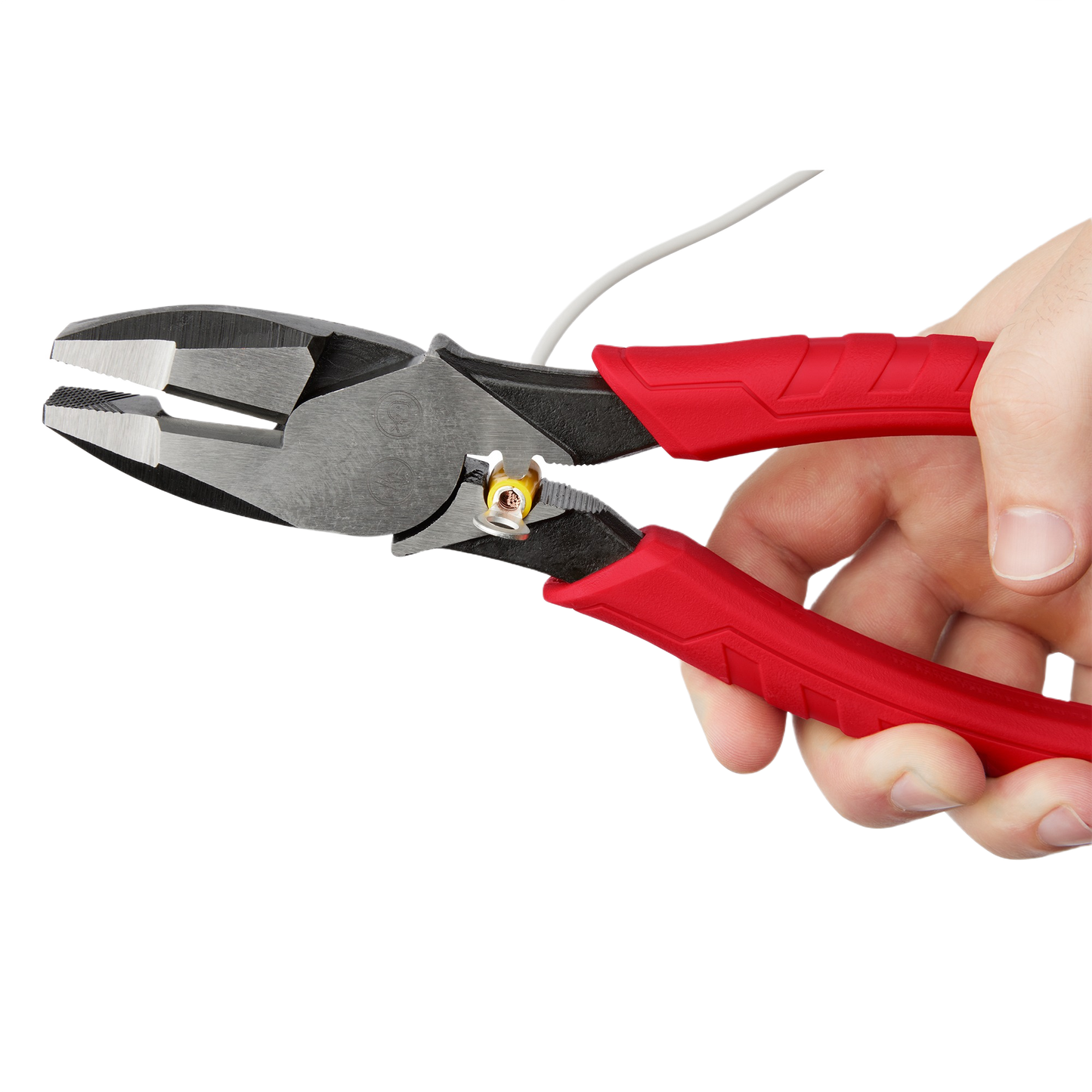 High leverage lineman’s pliers with red comfort grip handles held for cutting and crimping in hand tools and woodworking sets