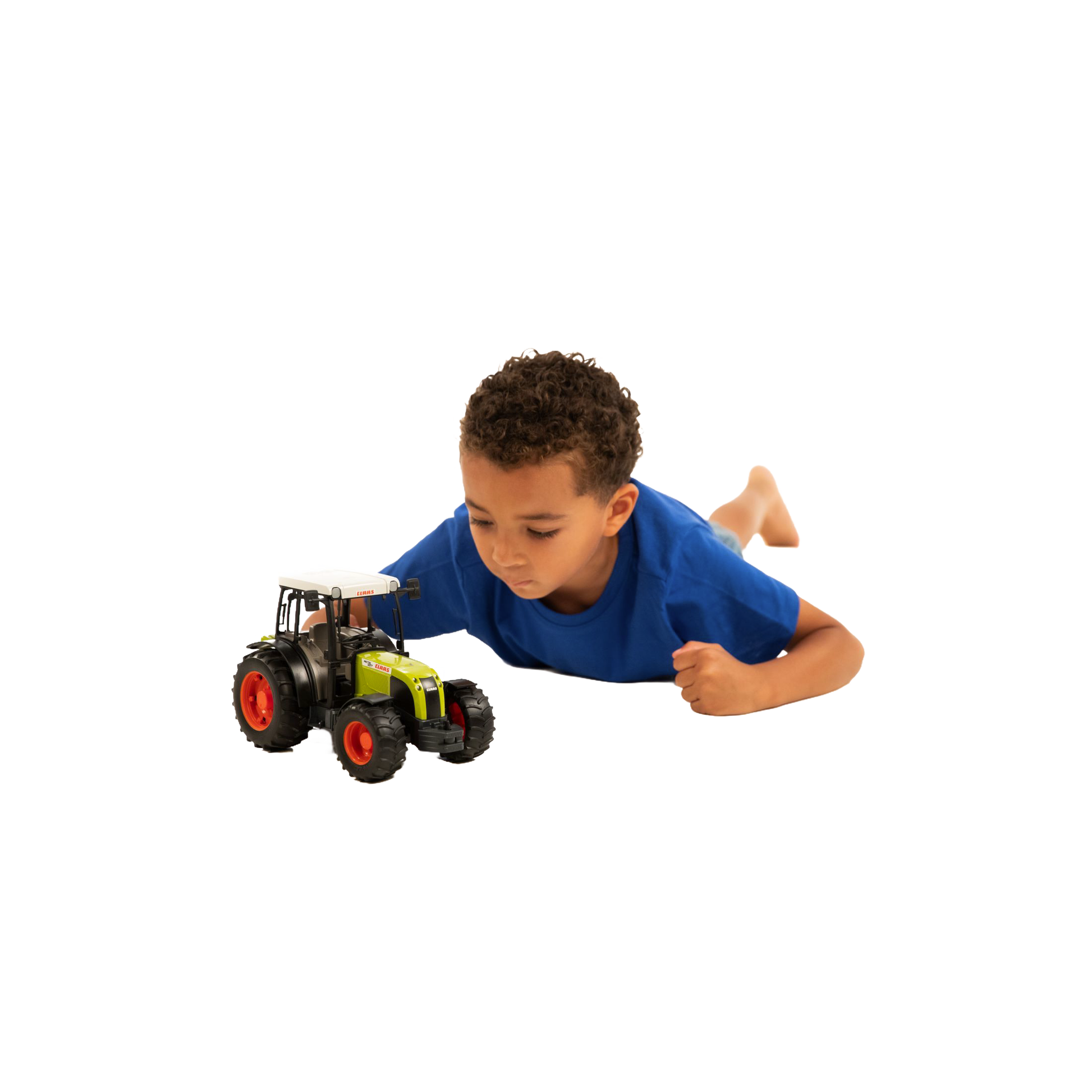 Young boy in blue shirt playing with green and black Bruder Claas Nectis 267 F Tractor toy from Vehicles & Remote Controlled Toys collection