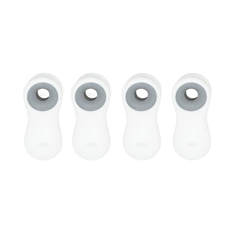 Set of four white magnetic clips with soft gray grips for versatile kitchenware and desk organization under 50 dollars