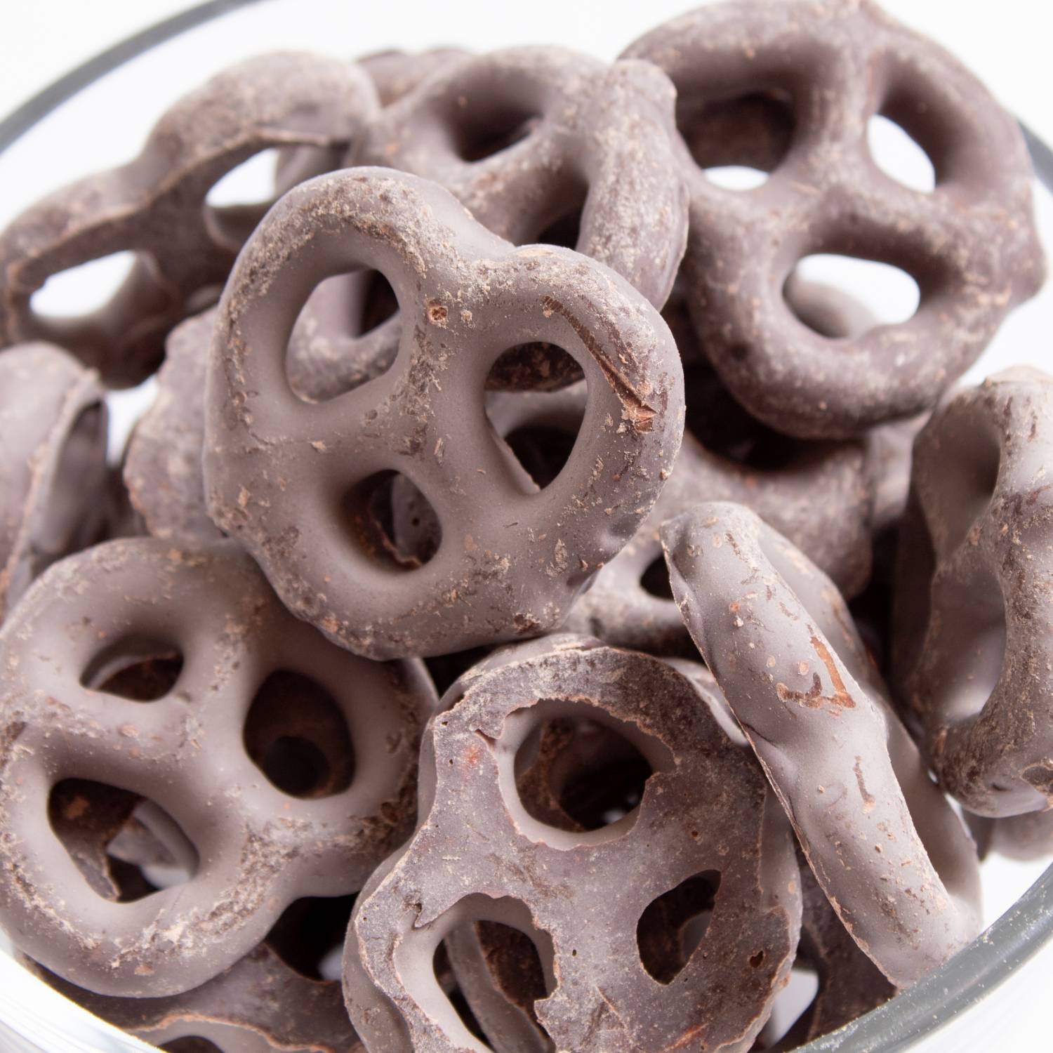 Close-up of mini pretzels coated in dark chocolate in Chips & Snacks and Food & Beverage collections under $50