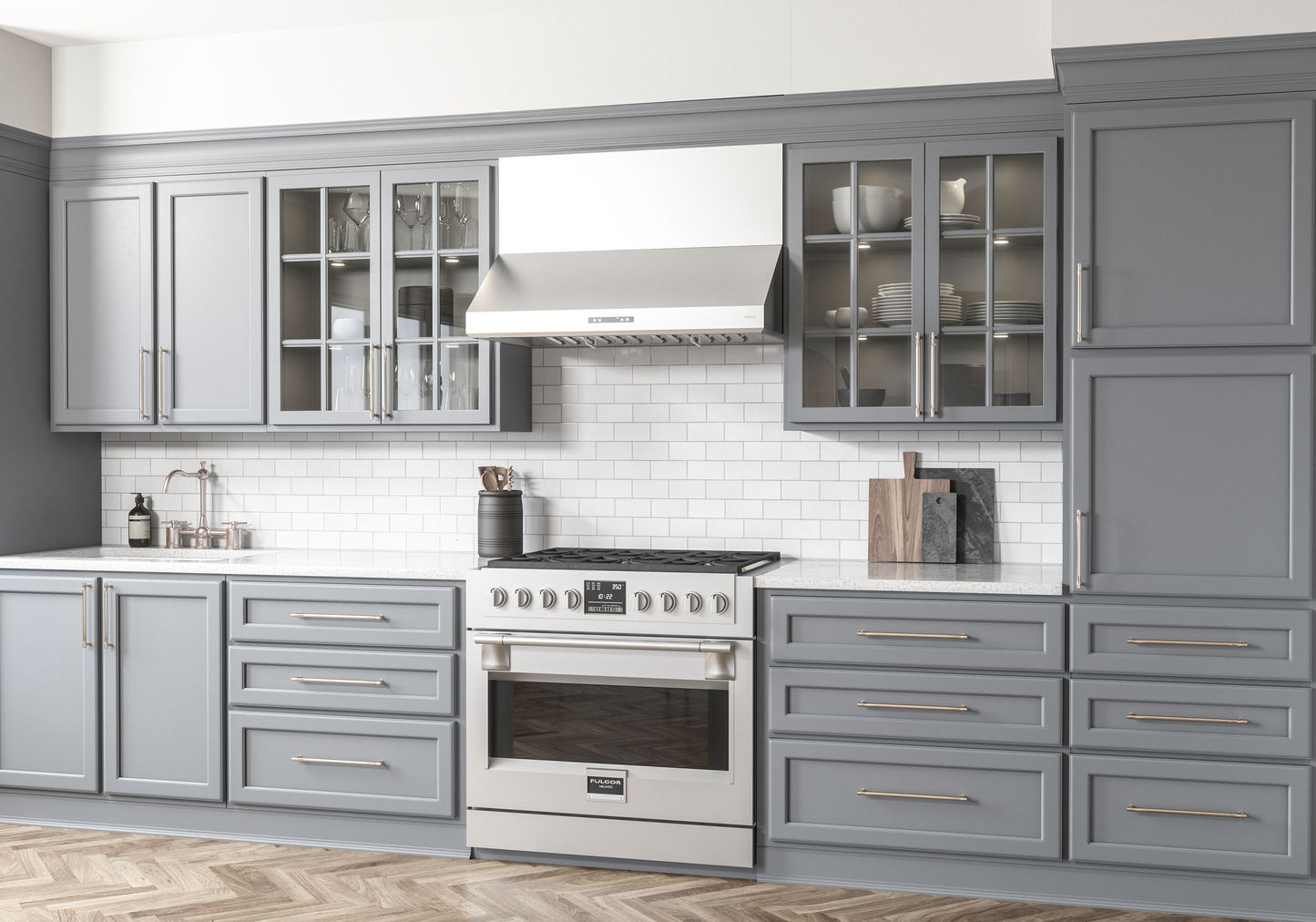 Under-cabinet stainless steel range hood with LED lighting installed above a gas range in a modern kitchen featuring gray cabinetry and white subway tile backsplash, part of Range Hoods, Kitchen & Kitchenware, and Appliances collections.