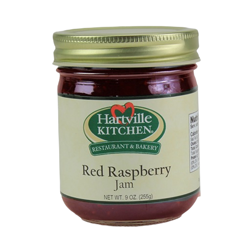 Glass jar of Hartville Kitchen red raspberry jam with gold lid, part of Jams & Jellies and Food & Beverage collections