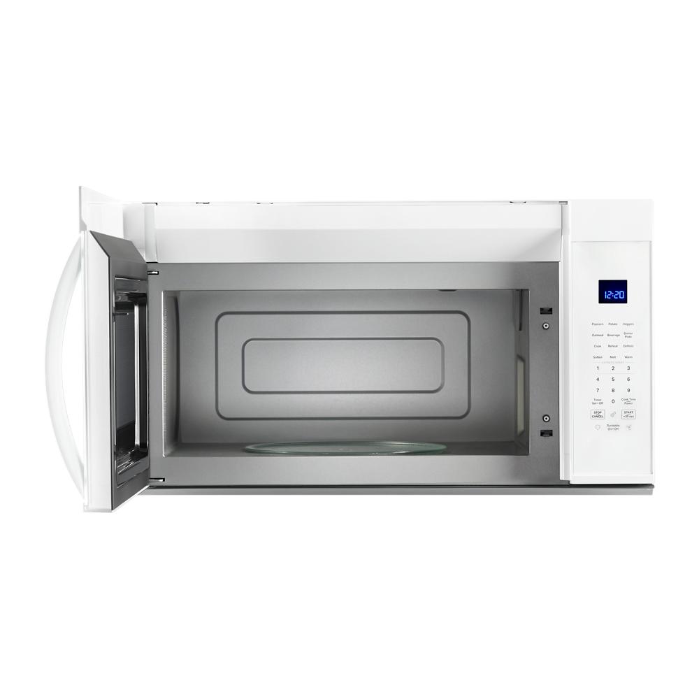 White over the range microwave with sensor cooking, digital display, and open door showing interior cavity and glass turntable