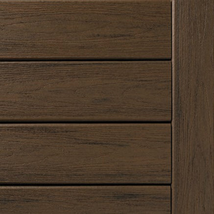 Close-up of dark roast composite wood riser board with horizontal plank design for home improvement projects