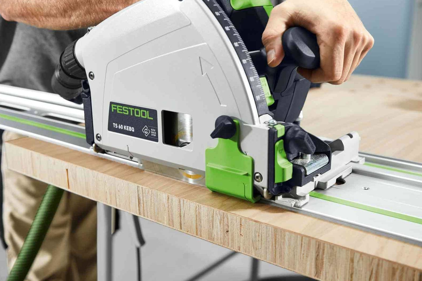 Track saw with Festool splinter guard accessory cutting wood for clean results in power tool and home improvement collections