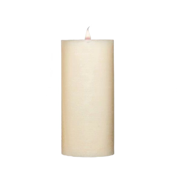 Lit rustic ivory pillar candle ideal for cozy home accents and decorative furniture settings under $50.