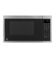 Stainless steel countertop microwave oven with digital keypad and green LED display in kitchen appliances collection