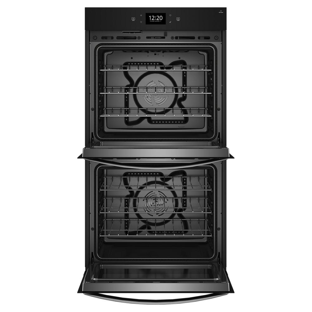 Double black smart wall oven with two open compartments and metal racks, part of kitchen appliances collection
