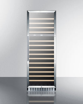 Tall sleek wine cellar with left-hinged door and wooden slide-out shelves in modern kitchen appliance setting