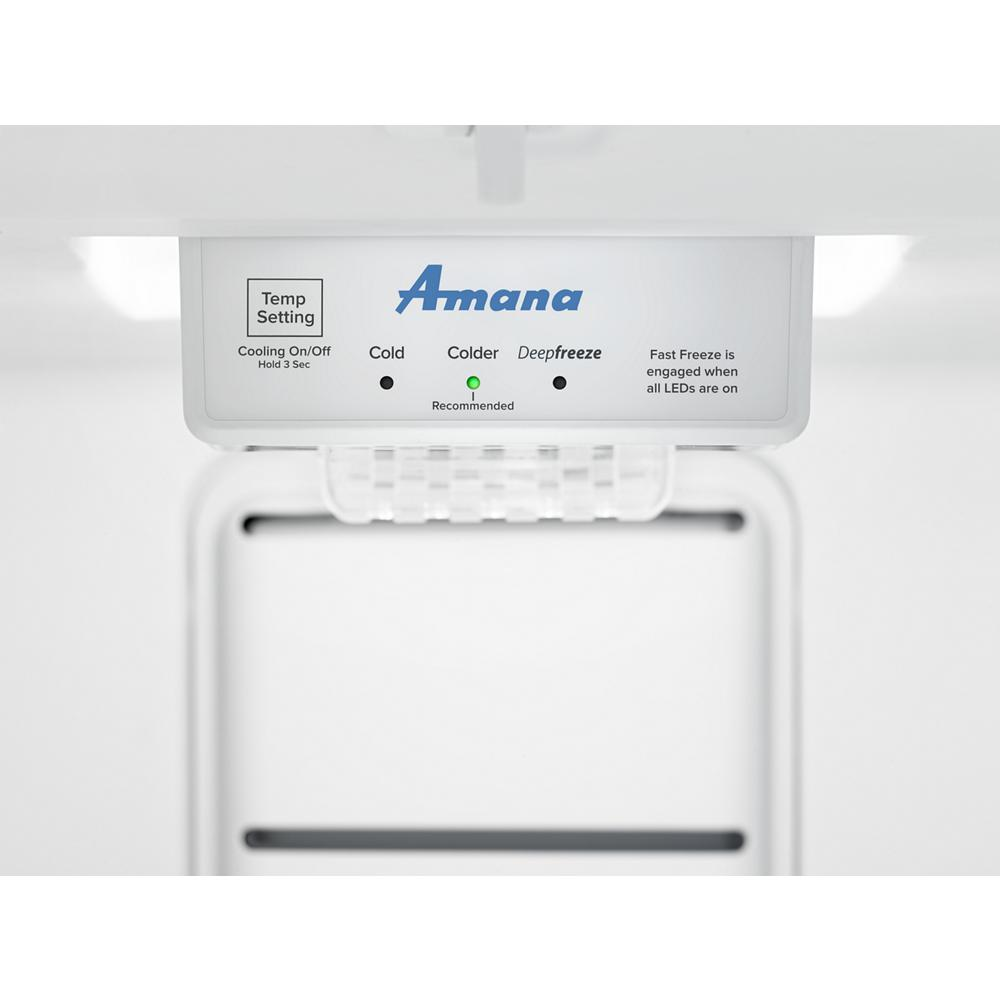 Control panel inside white upright freezer with temperature settings and fast freeze option in freezers collection
