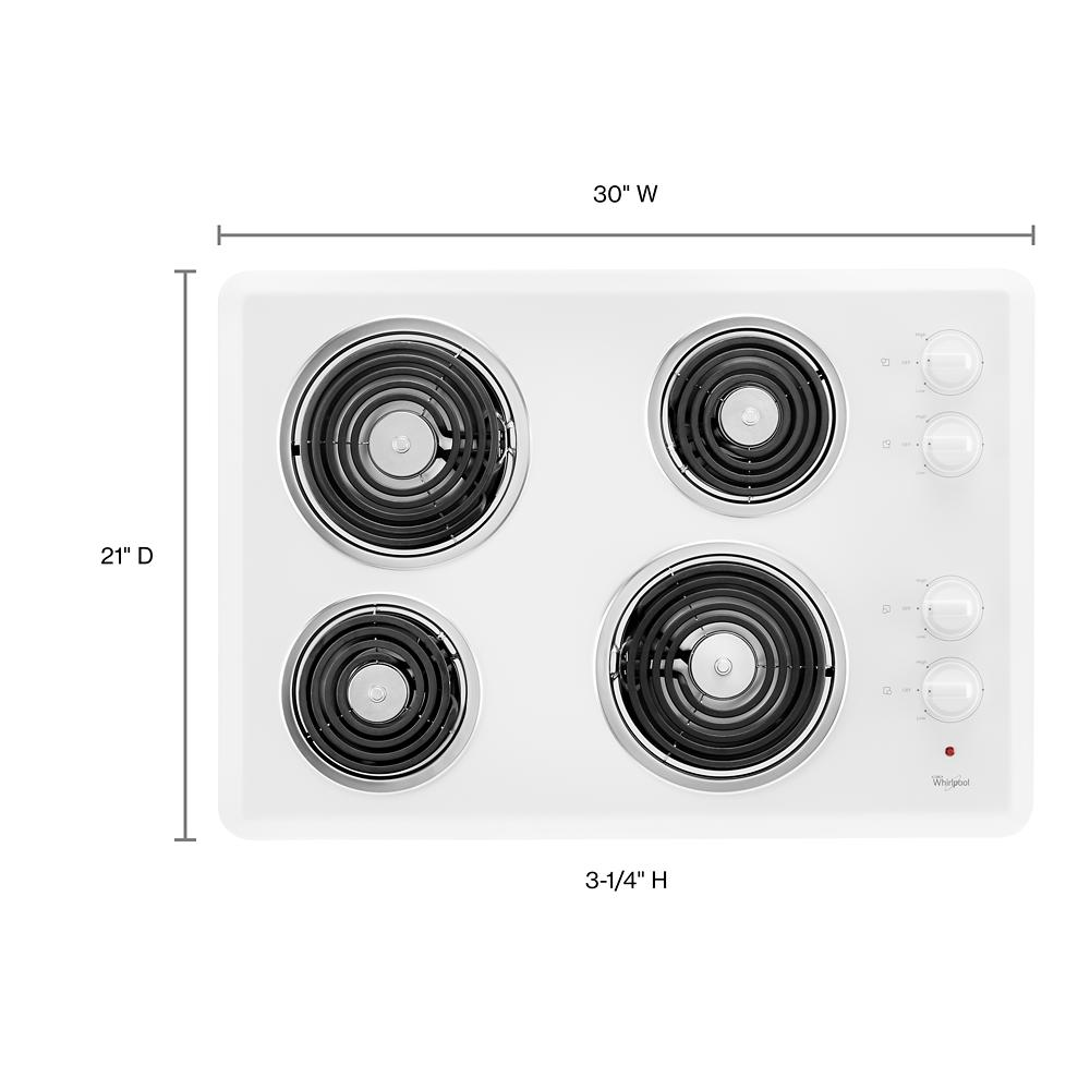 White Whirlpool electric cooktop with four coil burners and control knobs in kitchen appliance collections