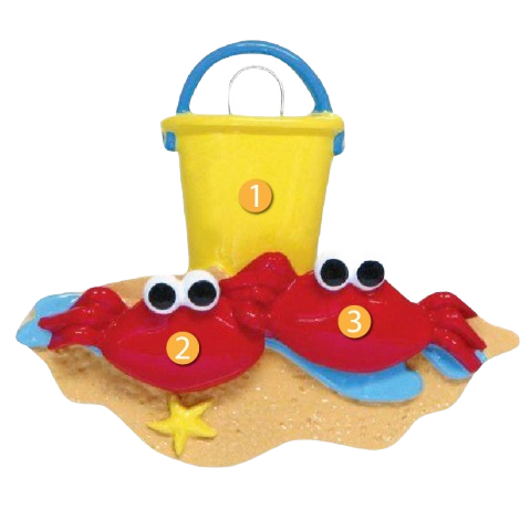 Yellow beach bucket with two red crabs and a starfish on sand in Christmas Ornaments & Tree Decorations collection