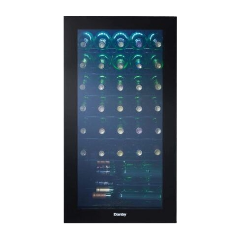 Free-standing wine cooler with blue LED interior lighting storing up to 36 bottles on black wire shelves in kitchen setting