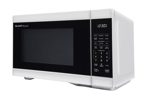 Compact white countertop microwave oven with digital display and preset cooking buttons in kitchen appliances collection