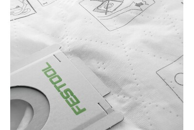 Close-up of Festool branded HEPA dust extractor filter bag with printed usage and safety instructions for air filtration tools.