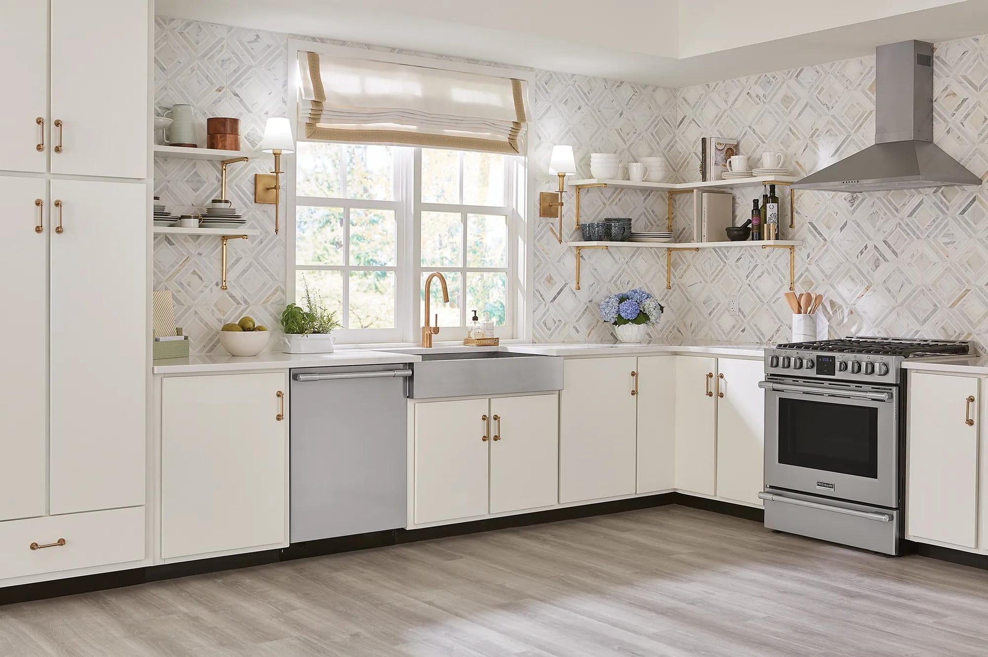 kitchen with stainless steel canopy wall-mounted hood and matching appliances in range hoods and kitchenware collection