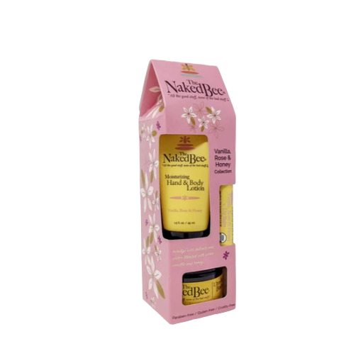 Pink gift set packaging containing vanilla, rose, and honey scented hand and body lotion and lip balm in Health & Beauty collections