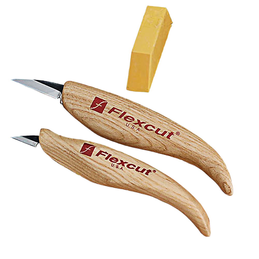 Two curved wooden-handled carving knives with a sharpening stone in woodworking tools and home improvement collections