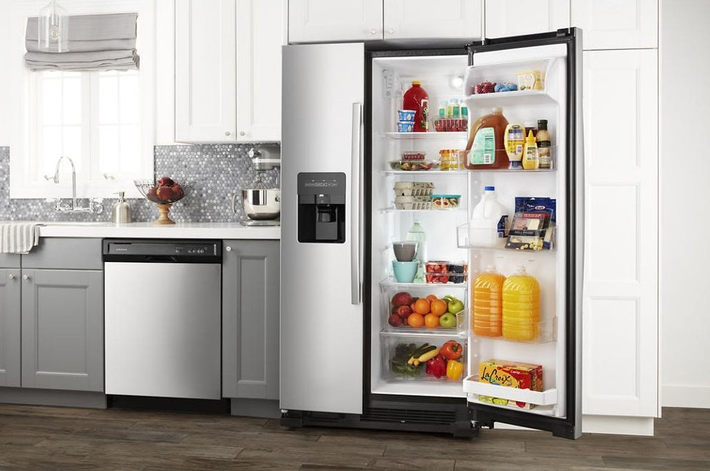 33-inch stainless steel side-by-side refrigerator with external ice and water dispenser in modern kitchen setup