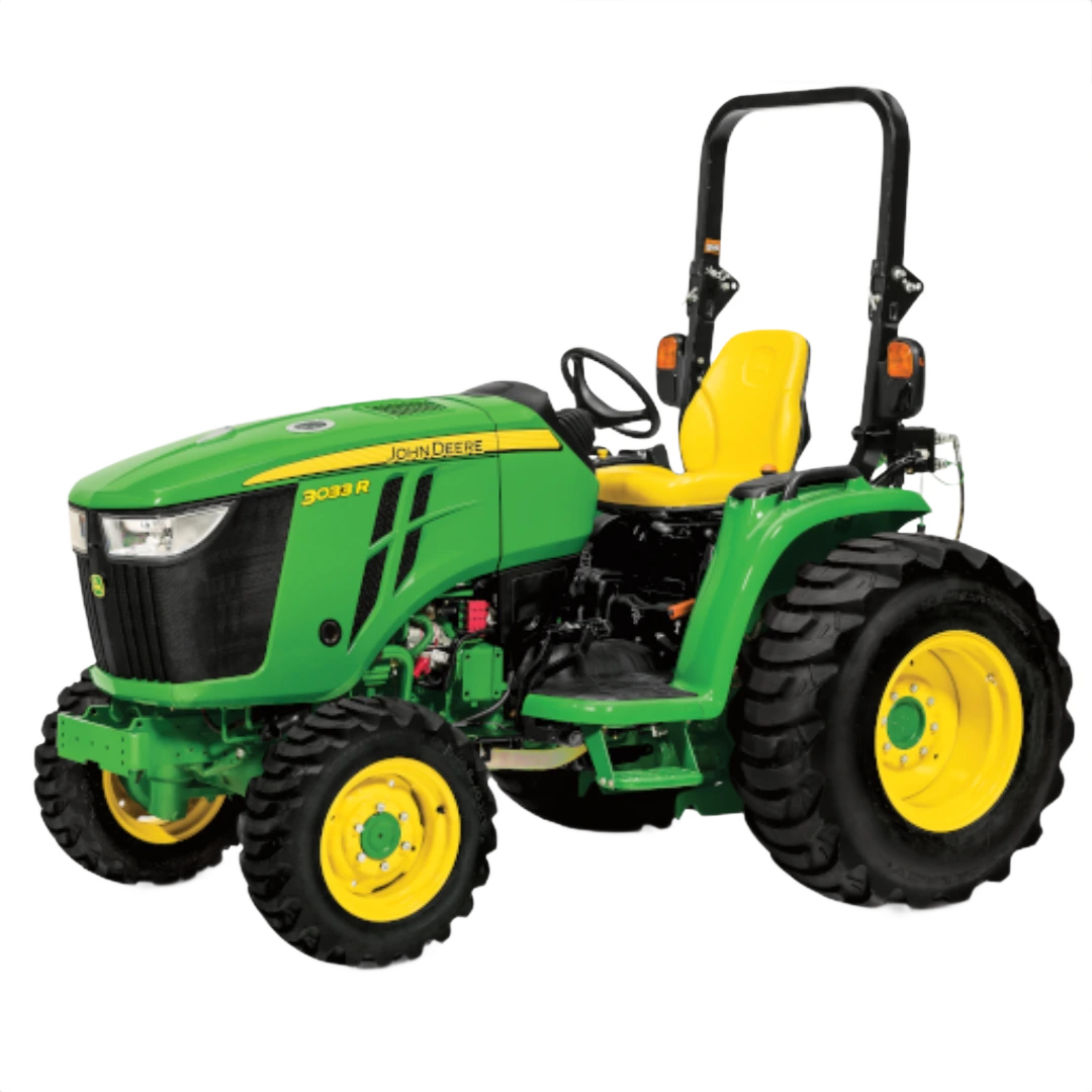Green and yellow John Deere 3033R sub-compact tractor with rollover protection and rugged tires, part of Outdoor Power Equipment at Hartville Hardware.
