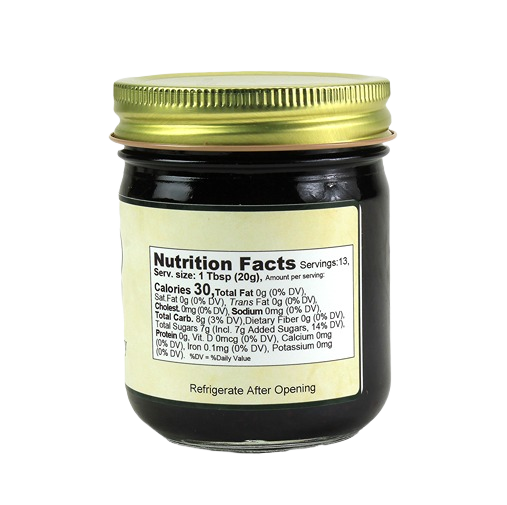 Back view of glass jar displaying nutrition facts label for black raspberry fruit spread in jams and jellies collection