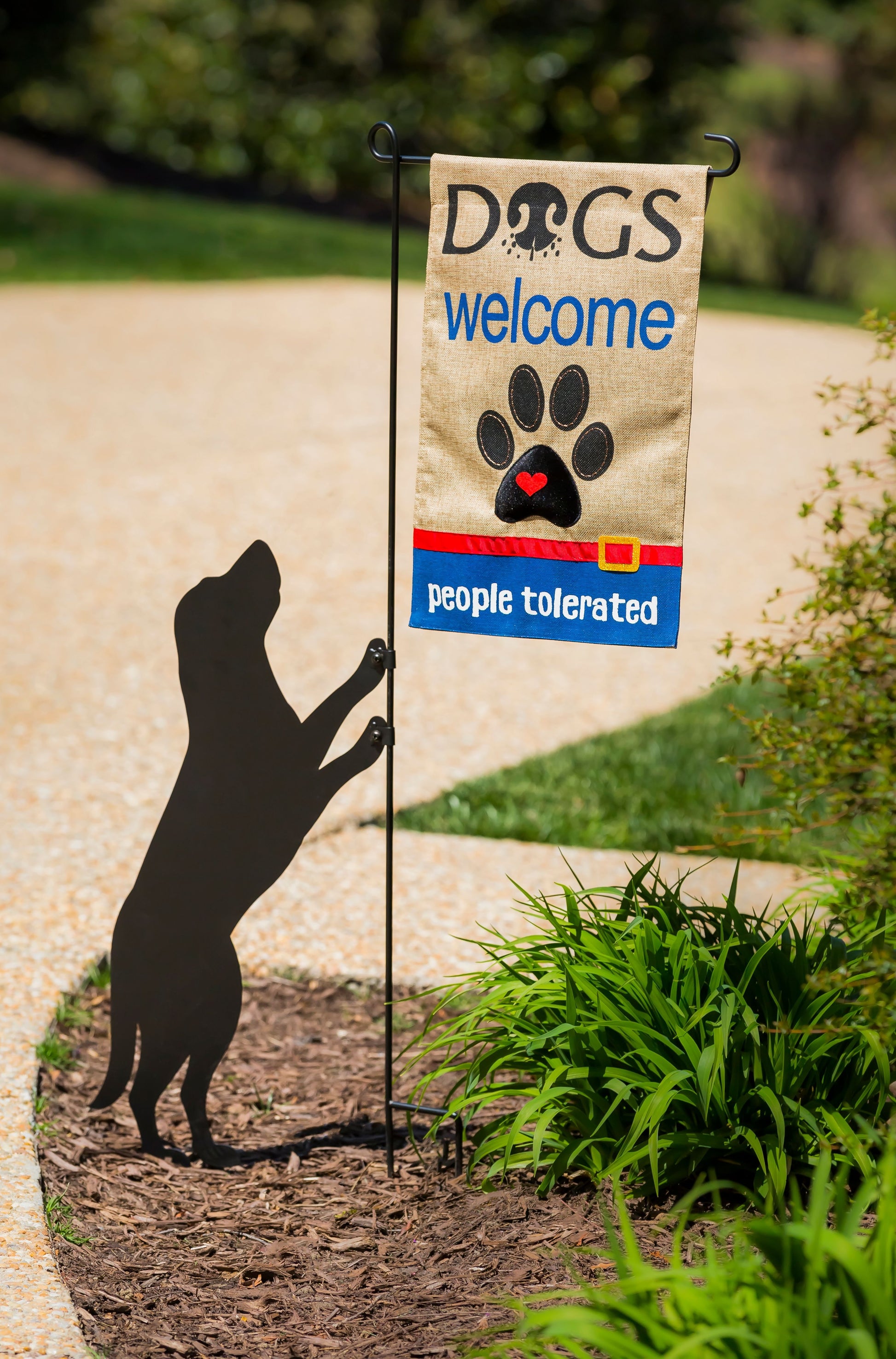 Black metal garden flag holder with jumping dog silhouette for outdoor flags in lawn and garden decor collections under $50