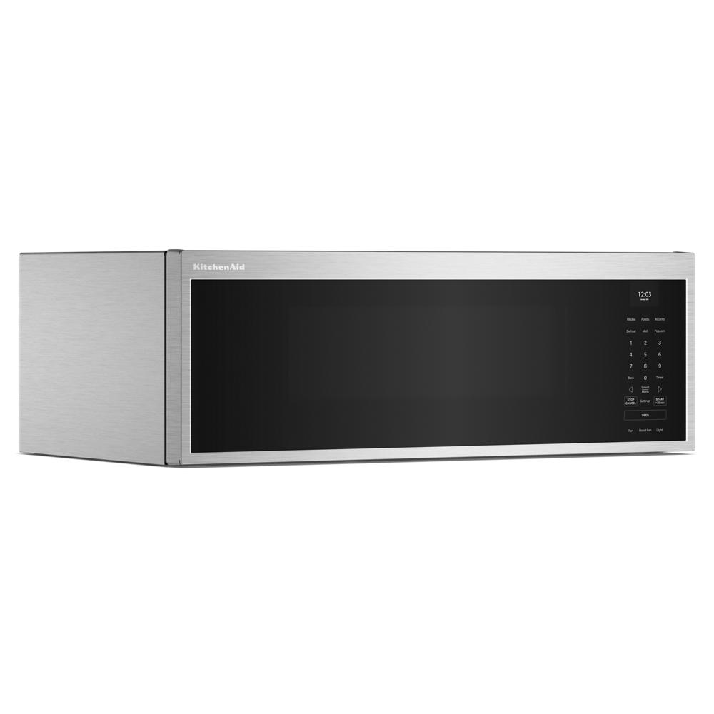 Stainless steel low profile microwave hood with digital control panel and dual fan ventilation in KitchenAid appliances collection