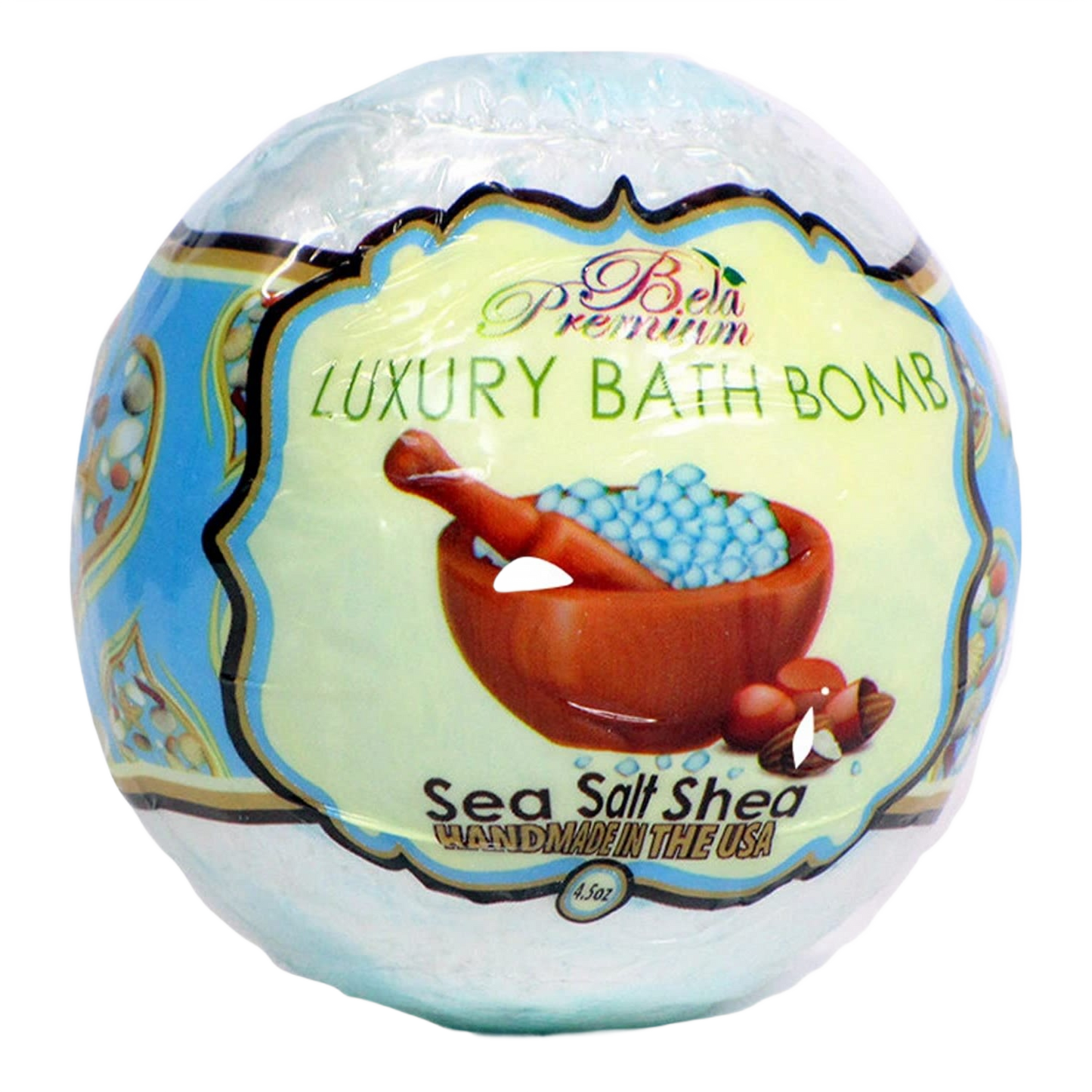 Round bath bomb wrapped in blue and cream packaging featuring a wooden bowl with blue sea salt crystals and shea nuts illustration