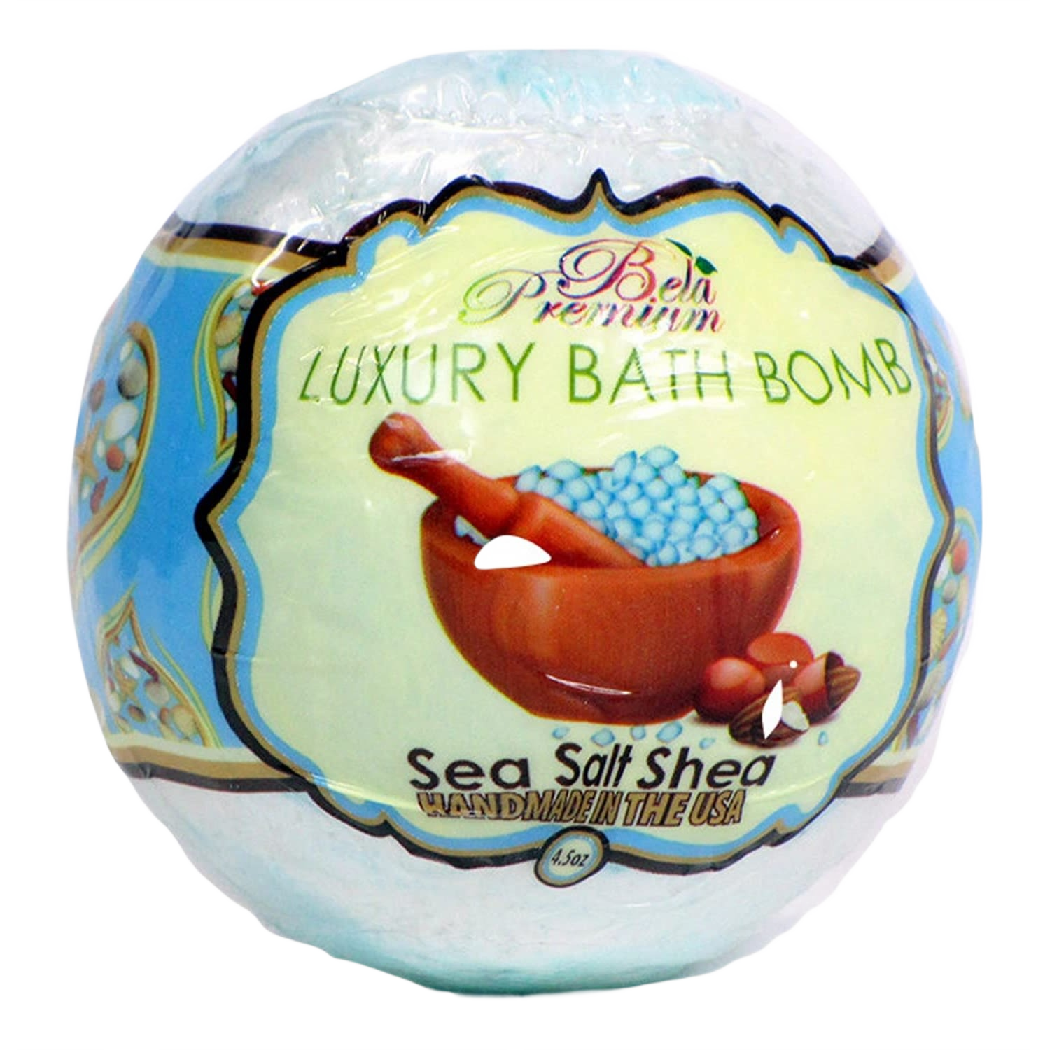 Round bath bomb wrapped in blue and cream packaging featuring a wooden bowl with blue sea salt crystals and shea nuts illustration