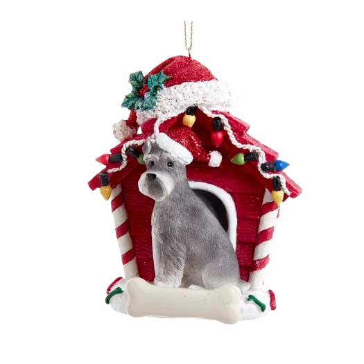 Gray schnauzer dog figurine wearing Santa hat in red dog house decorated with holiday lights and holly accents