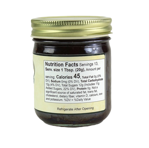 9 oz jar with gold lid showing nutrition facts label for Hartville Kitchen Old Fashioned Traffic Jam in Jams & Jellies collection