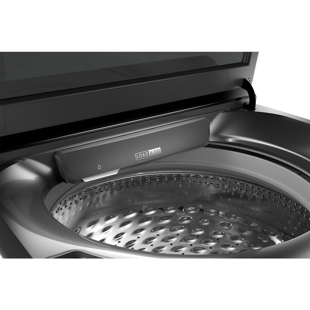 Open black top load washer showing stainless steel drum and detergent dispenser in washer and dryers collection