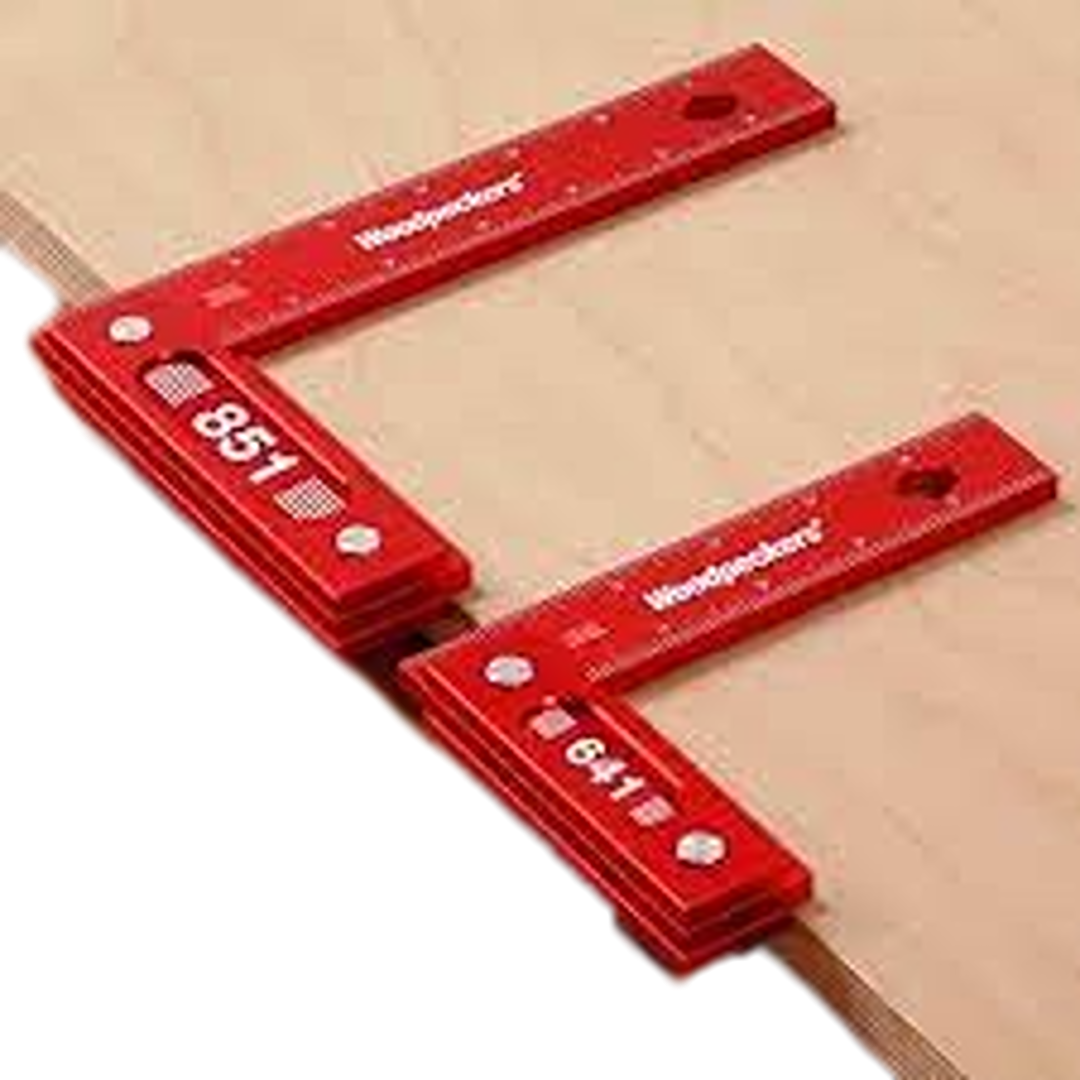 Red aluminum measuring squares with interior shoulder design for precise woodworking in hand and measuring tool collections