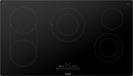 Black-glass electric cooktop with multiple heating elements and touch controls from Bosch kitchen appliances collection