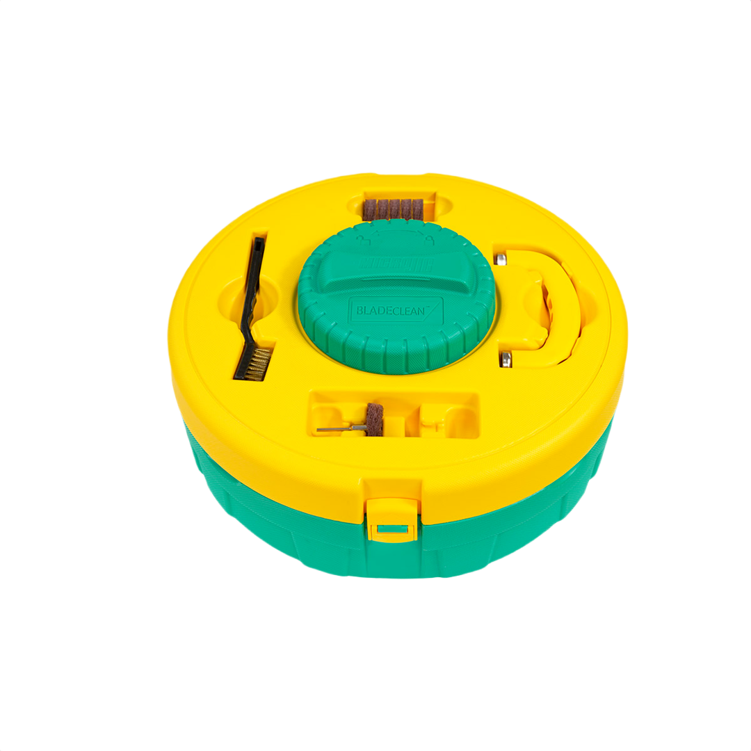 Round yellow and green blade and bit cleaning system with included brushes and sanding attachments for tool maintenance