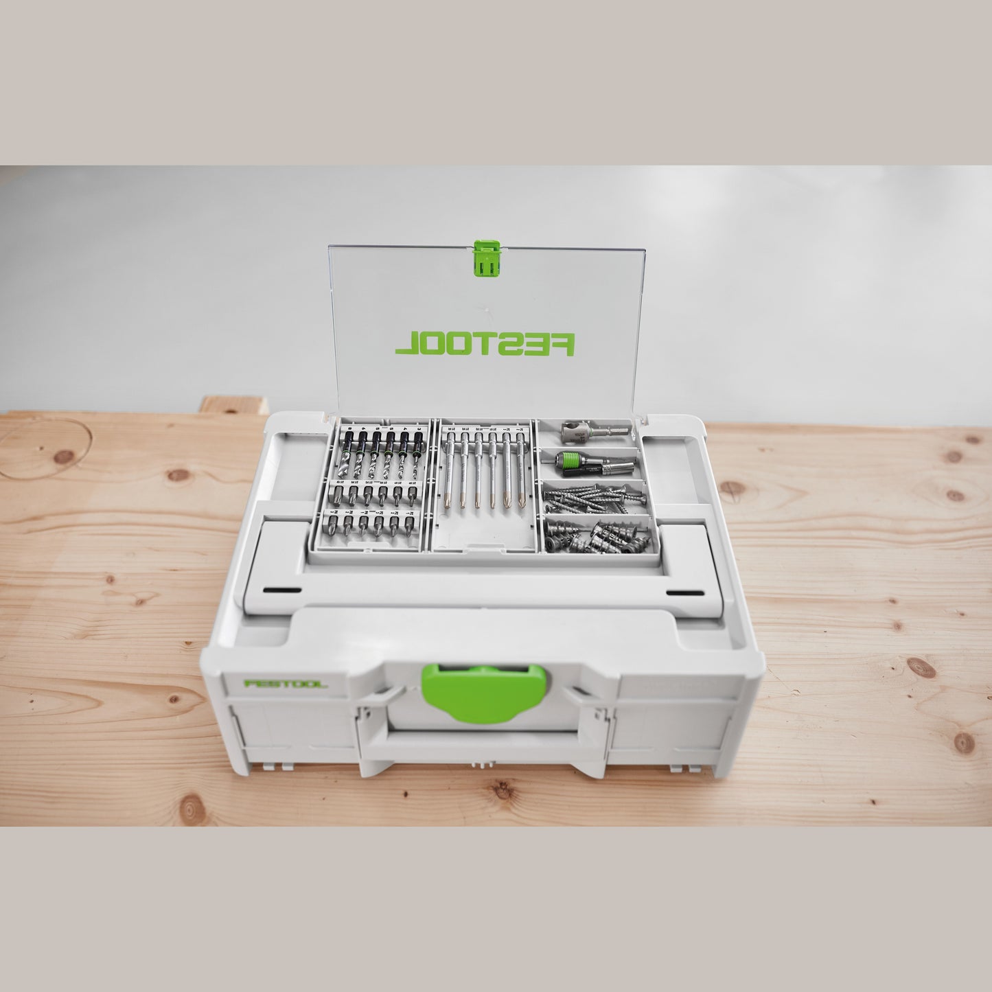 Compact white and green Festool tool storage box with transparent lid compartment for organized woodworking tool storage