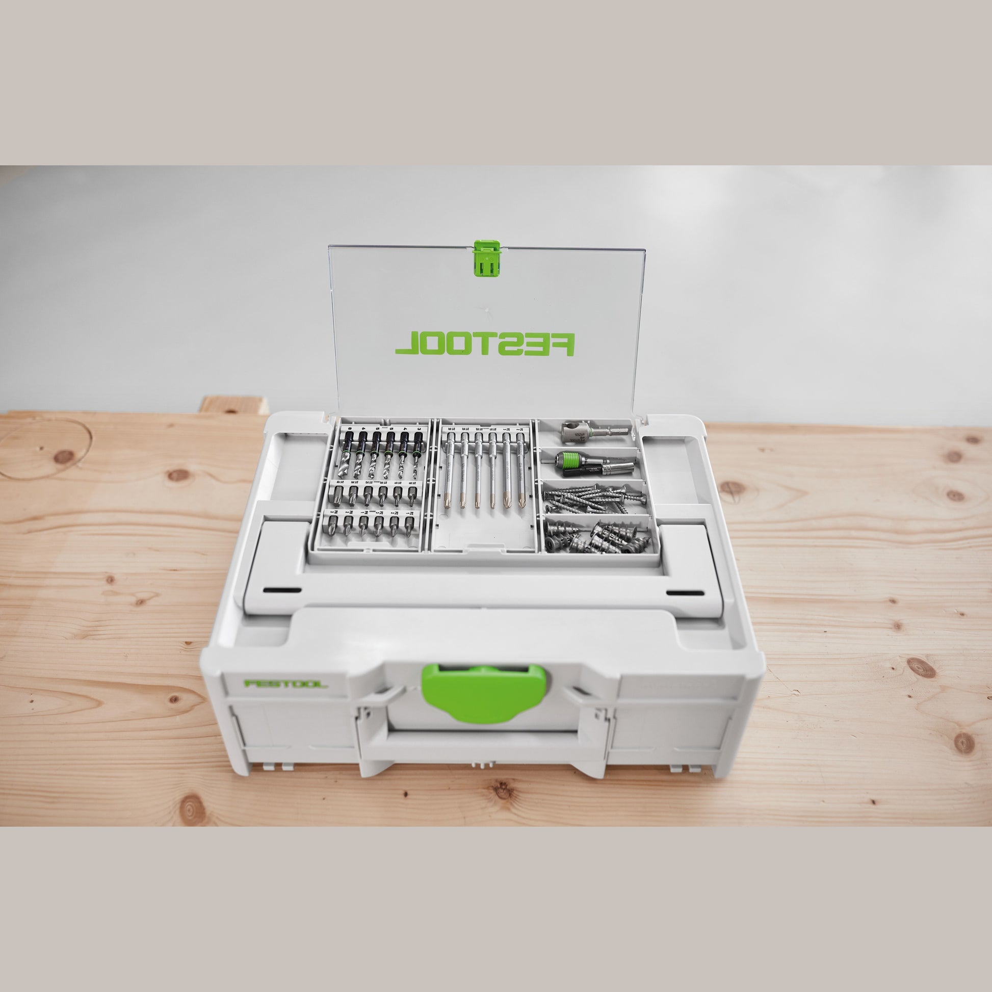 Compact white and green Festool tool storage box with transparent lid compartment for organized woodworking tool storage