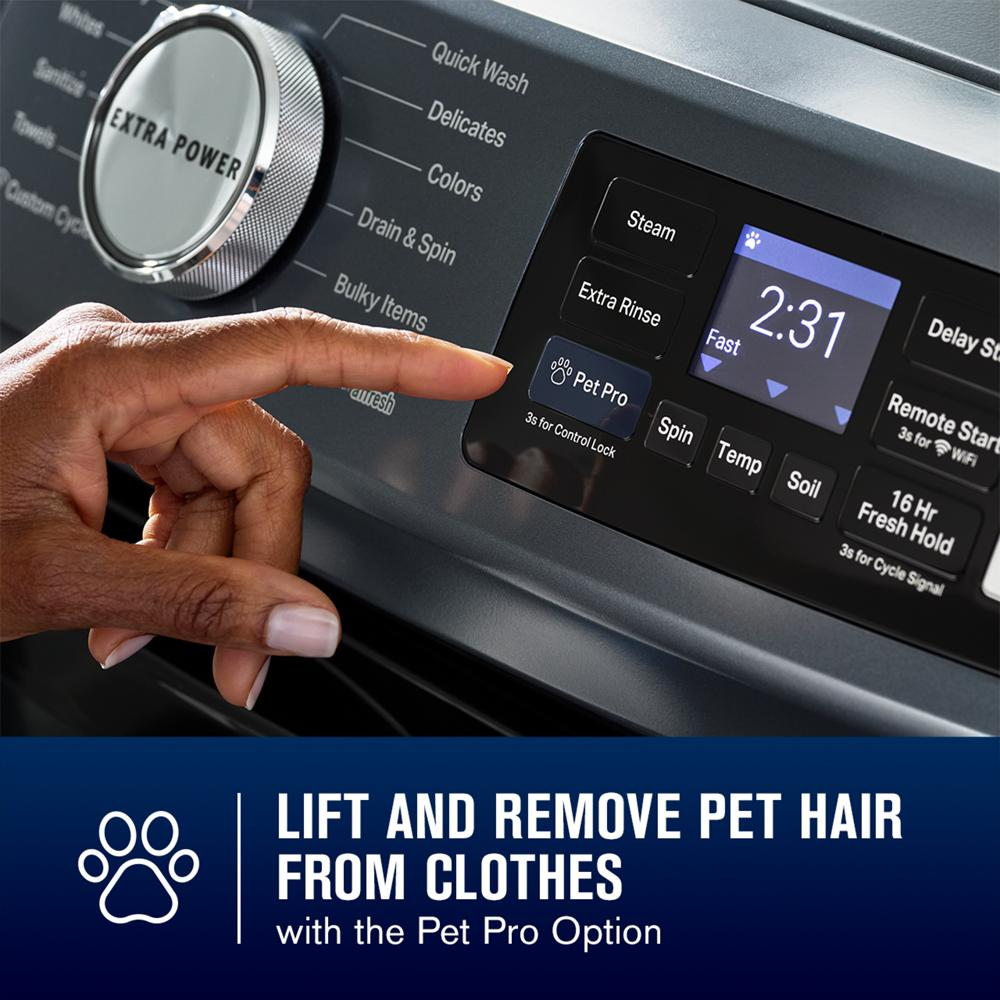 Finger pressing Pet Pro option on control panel of gray front load washer in laundry appliances collection