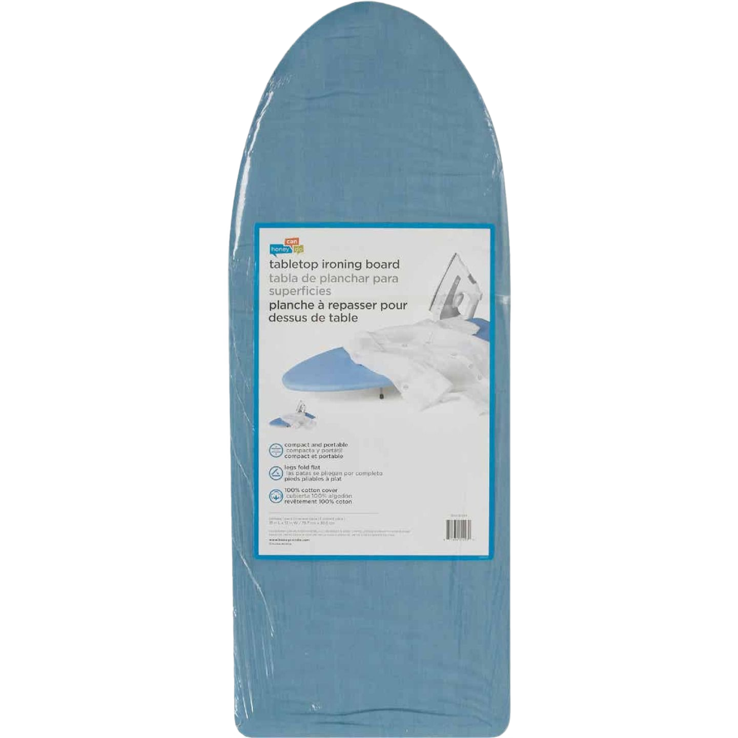 Portable blue table top ironing board with cotton cover and foldable metal legs for laundry and household use