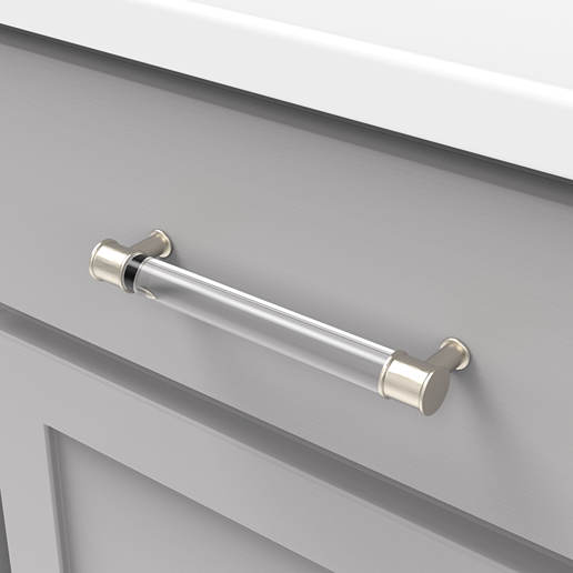 Clear acrylic cabinet pull with satin nickel ends mounted on gray cabinet in hardware and furniture accessories collections