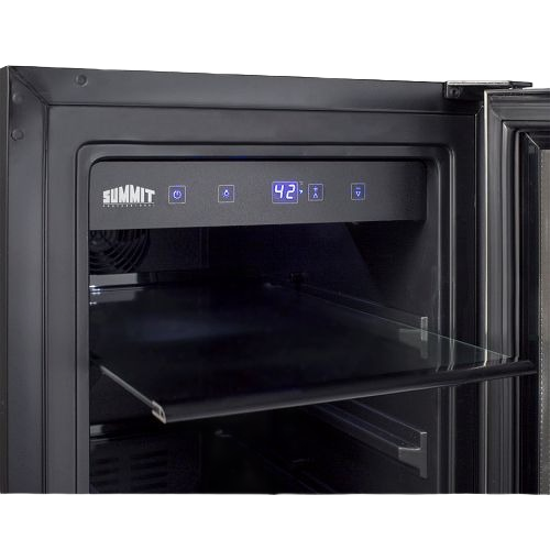 interior view of black beverage center with digital temperature control and glass shelf in kitchen appliances collection