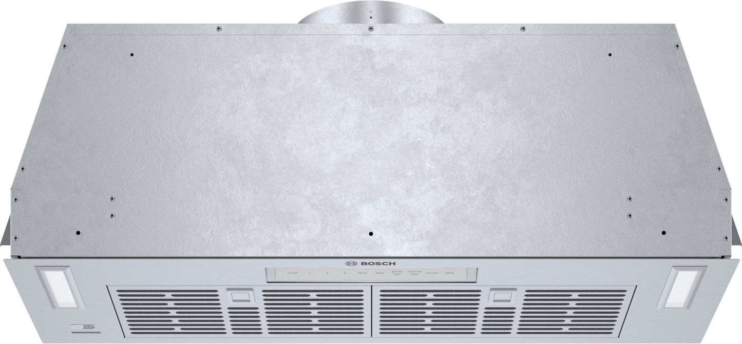 Stainless steel custom insert ventilation hood with dishwasher-safe mesh filters from Bosch range hoods collection