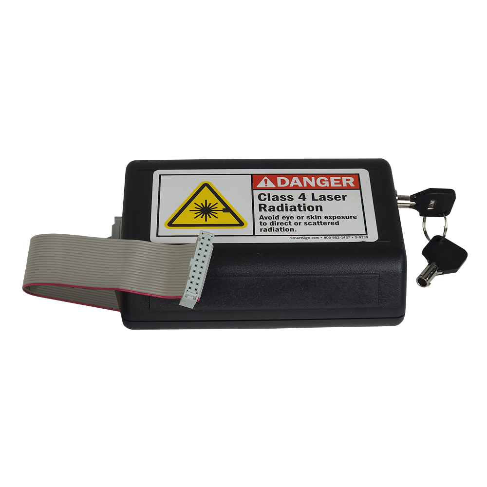 Black solid state laser module with warning label, ribbon cable, and two keys for tools and home improvement use