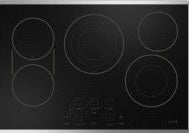 Black electric cooktop with five cooking zones and touch controls in kitchen appliances and cooktops collection