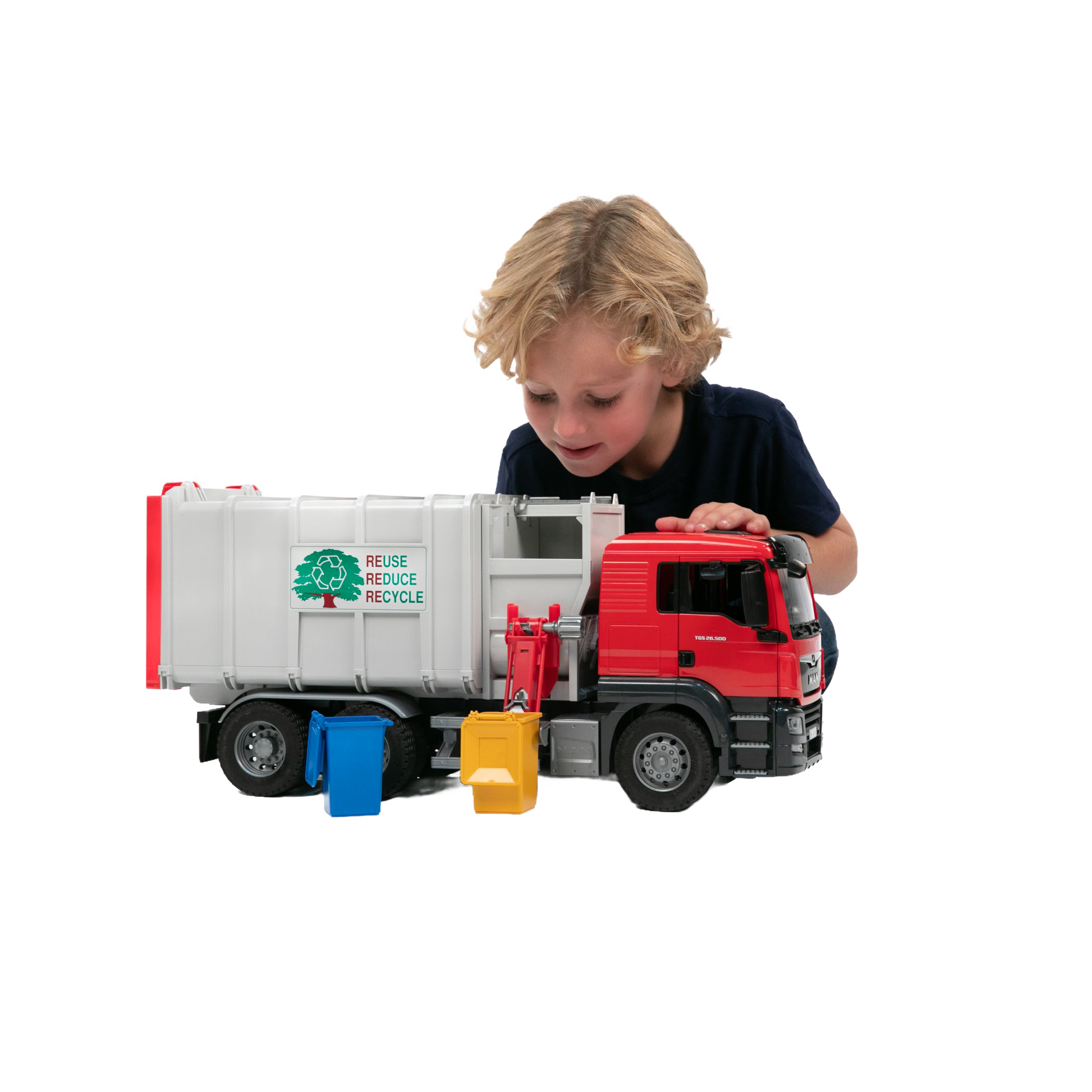 Child playing with red and white side loading garbage truck toy and blue and yellow recycling bins from Bruder Toys collection