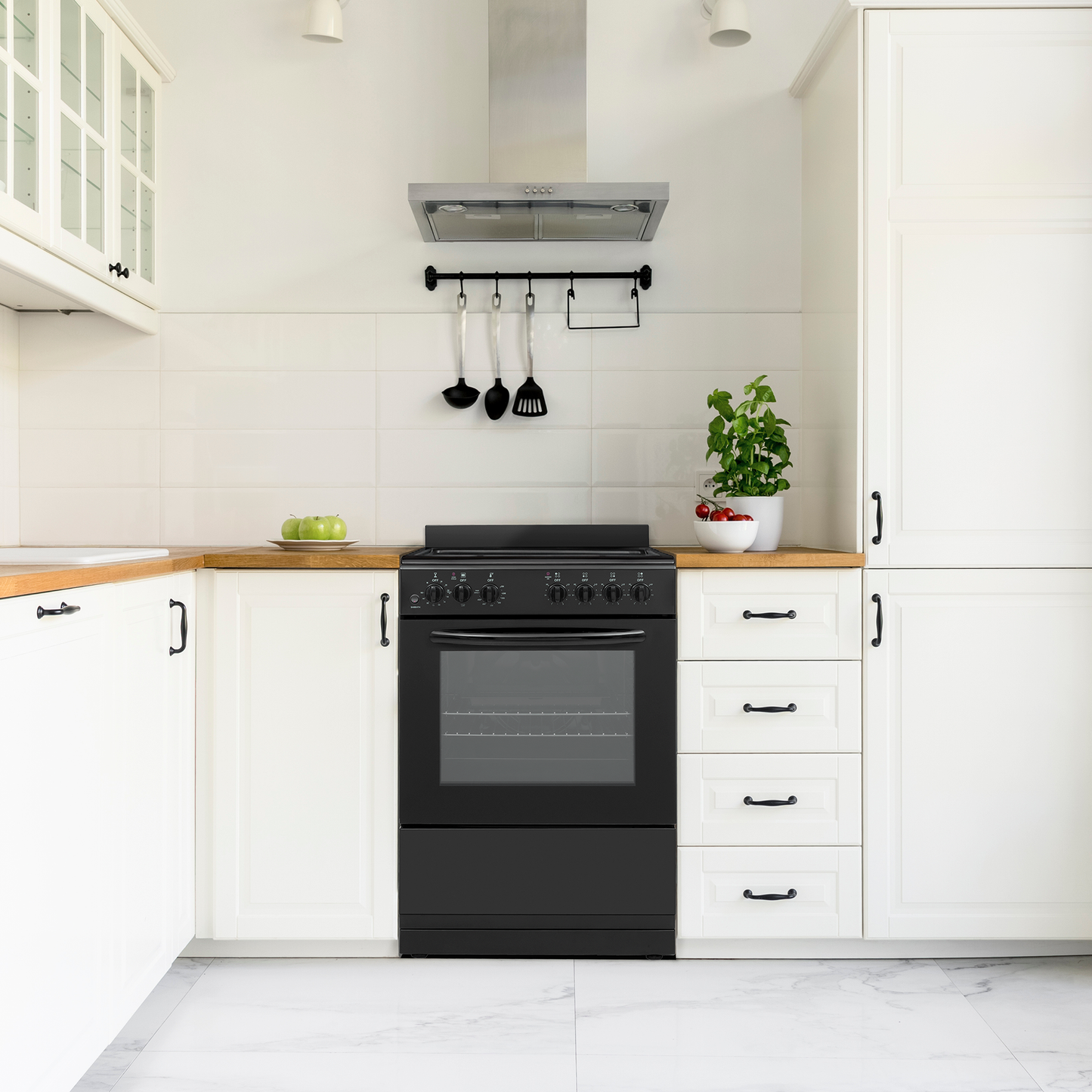 Compact black electric range with multiple control knobs under stainless steel vent hood in modern kitchen appliances collection