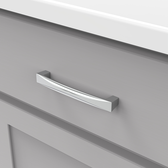 Chrome cabinet pull with subtle curves on gray drawer, suitable for furniture hardware and home improvement projects under $50
