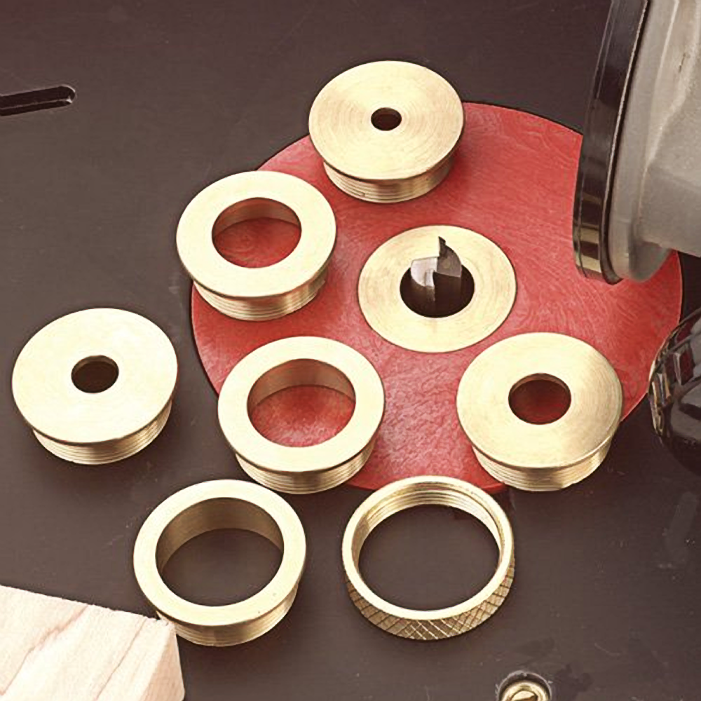 Set of brass plate reducers for router base inserts in tool accessories and power tool collections under 100 dollars