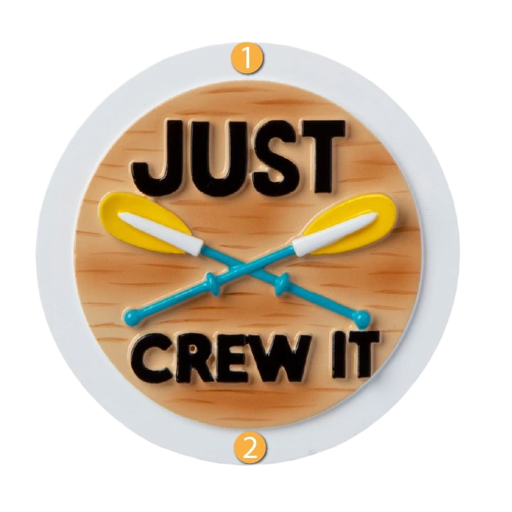 Round Christmas ornament with wooden background, crossed yellow and blue paddles, and "Just Crew It" text under $50 collection