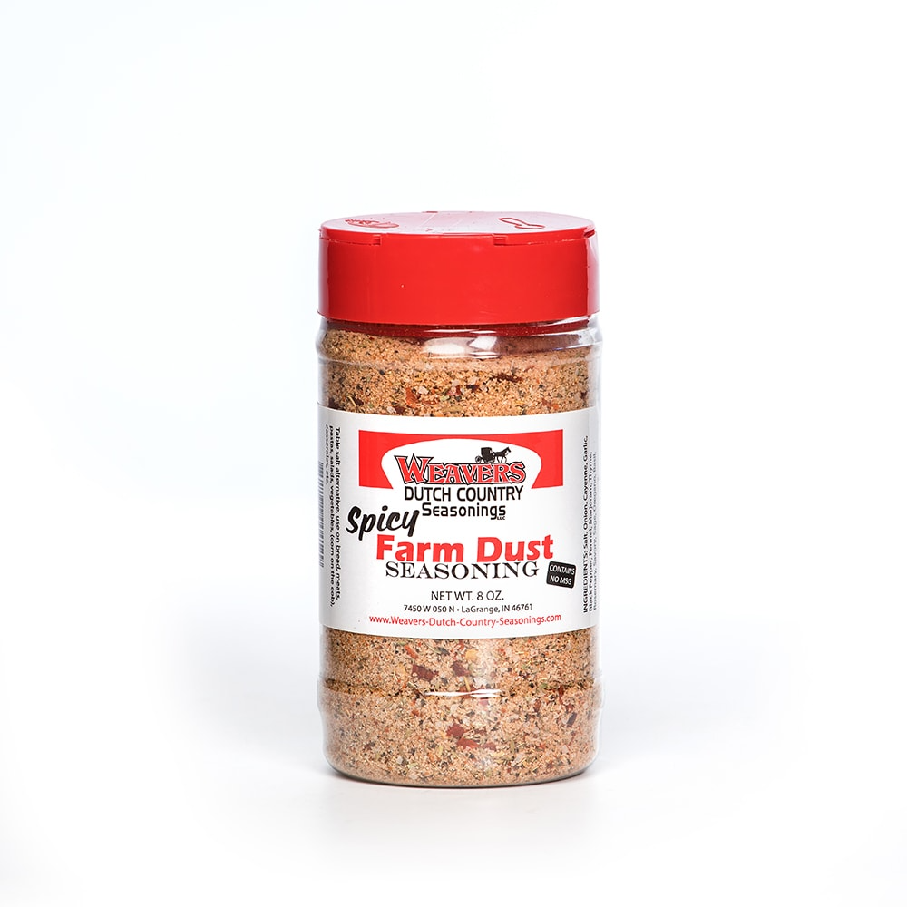 Clear plastic shaker bottle of spicy seasoning blend with red lid from Grilling Sauces & Spices collection